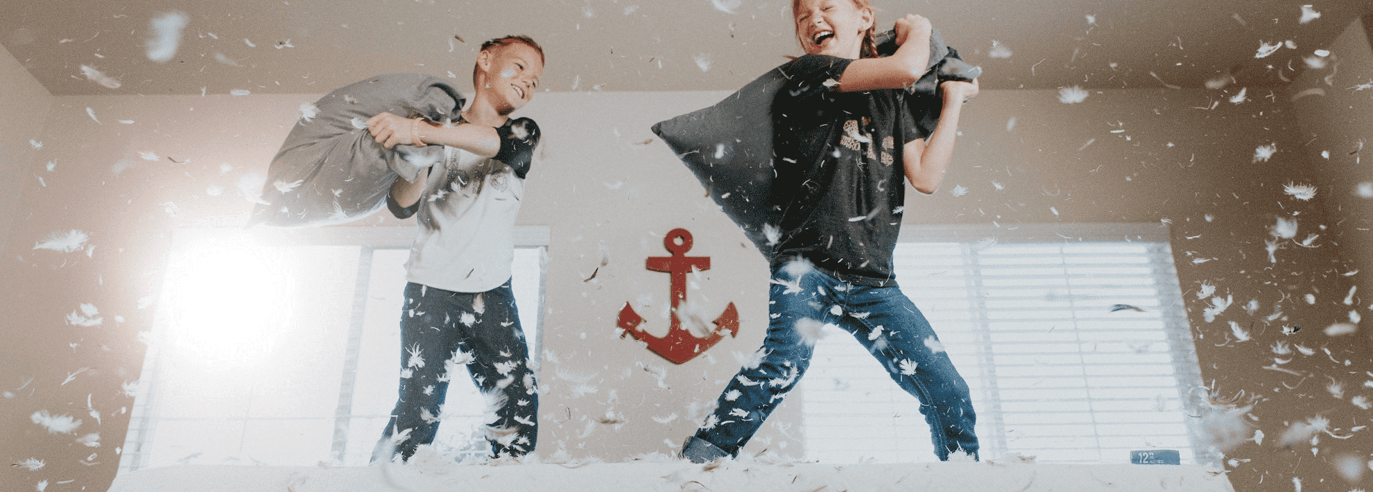 kids having pillow fight