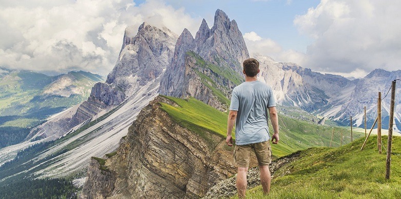 man standing in front of building