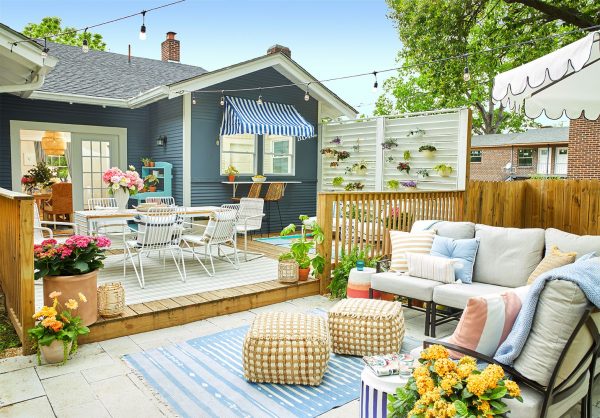 a cosy outdoor entertainment area with colorful pillows