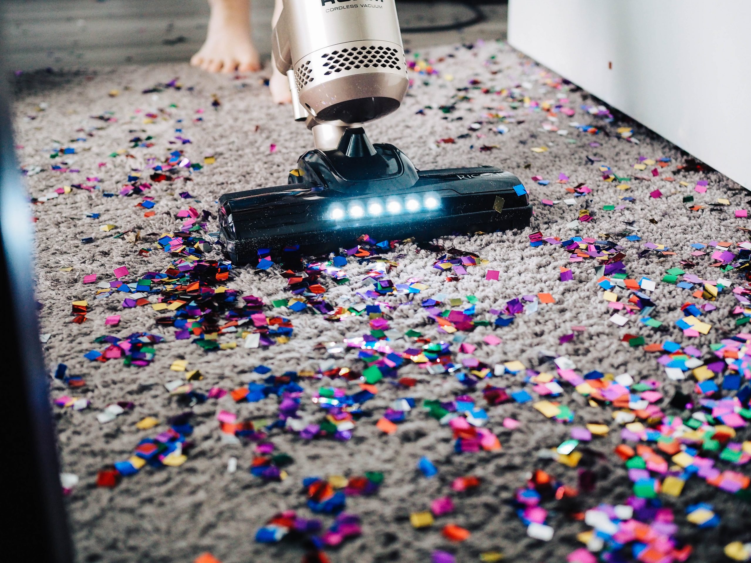 Glitter spread all over the floor with a vacumme