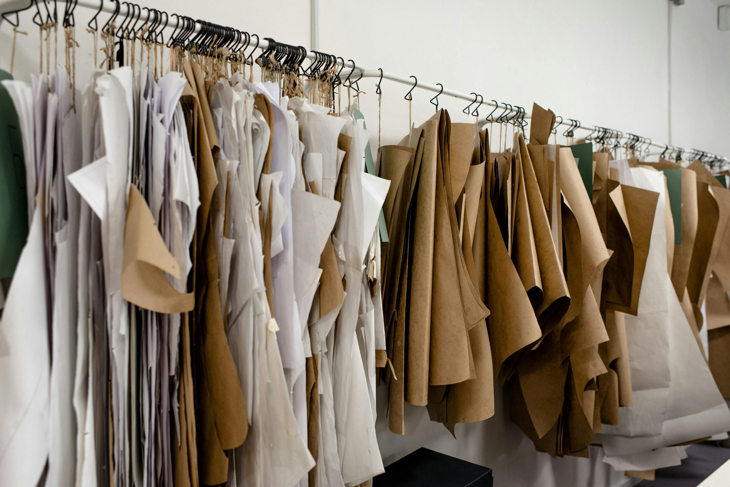 storage for small business inventory. Sewing patterns hanging in storage.