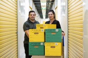 EZS_20250620_029_Lorenzo-Anushka with trolley-archive boxes-close up